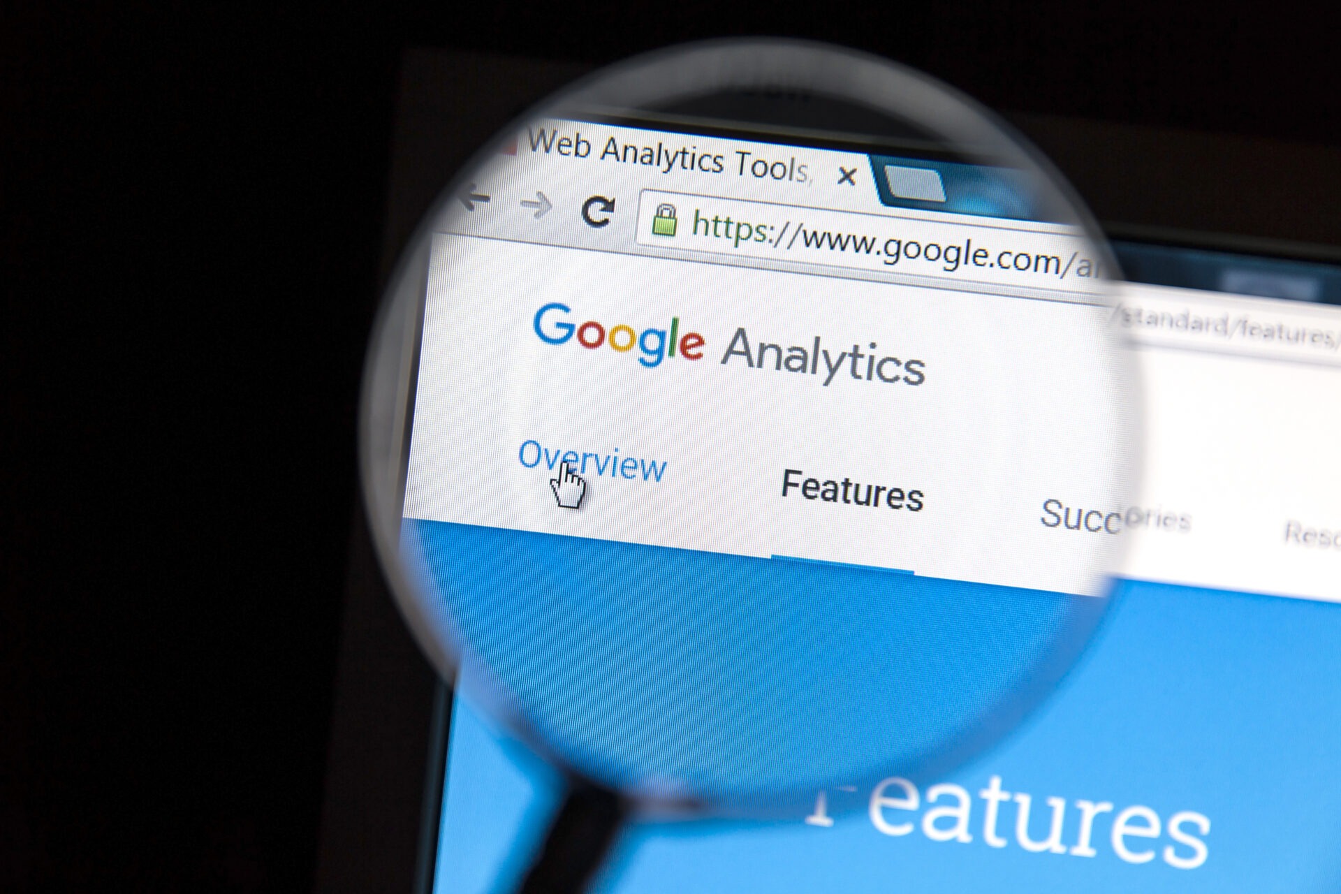 magnifying glass showing google analytics