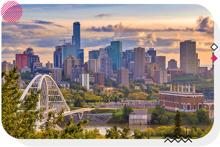 Edmonton skyline with lots of tall buildings and a bridge on the left