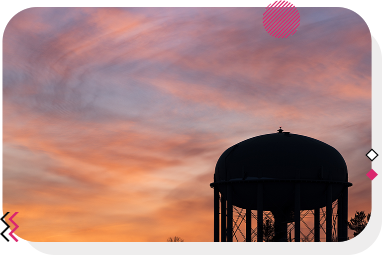 Stittsville water tower with a sunset in the background