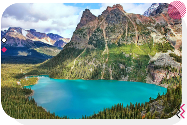 Mountains with a small light blue lake in front